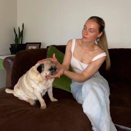 Maya Oakley with her pet dog Daisy